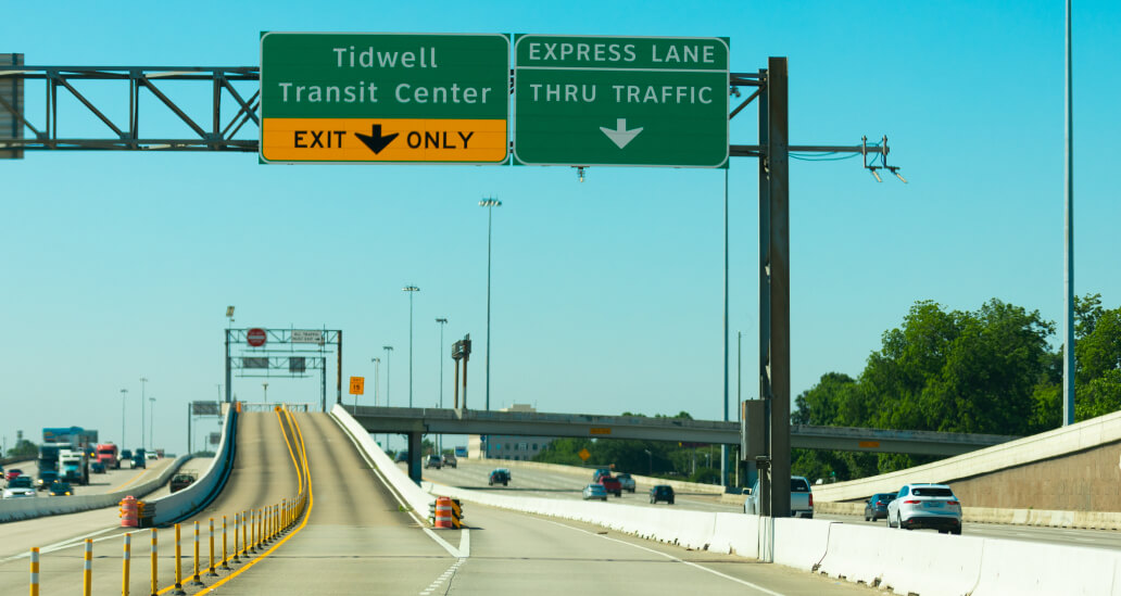 Express lane exit signage toward the Tidwell Transit Center.