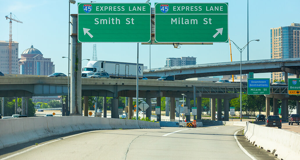 I-45 North inbound express lane exit towards Smith Street or Milam Street in in downtown Houston.