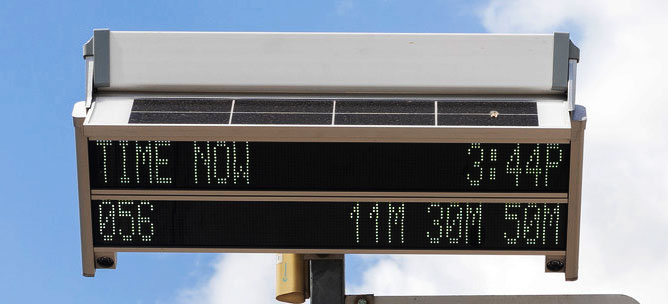 METRO's digital signage at a bus stop.