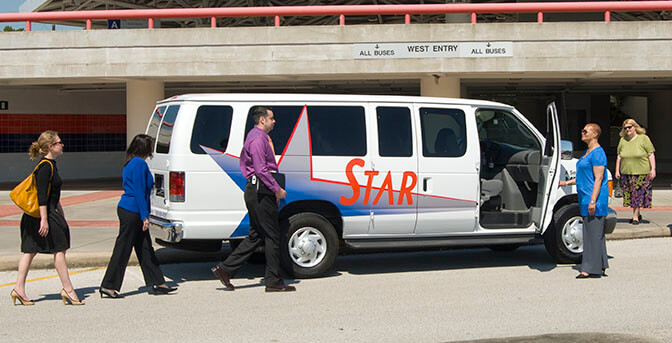 Riders boarding a METRO Vanpool van.