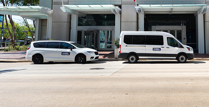 METRO Vanpool vans and sedans in downtown.