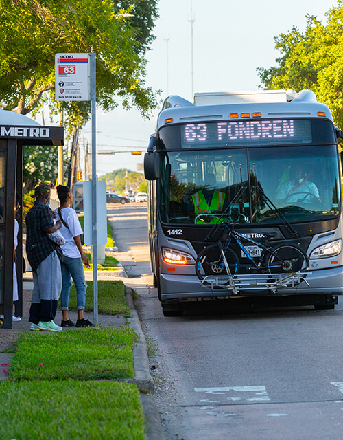 METRO riders board the 63 Fondren local bus.