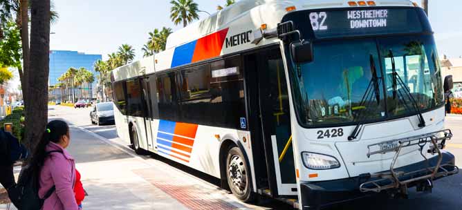 METRO local bus stoping to pick up customer.