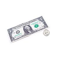 A dollar bill with a quarter sitting next to it